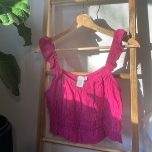 Beautiful magenta top that can be worn off the shoulder.
